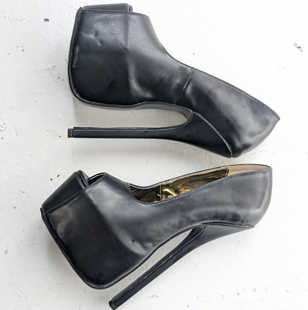 Extra tall platform high heel shoes well worn